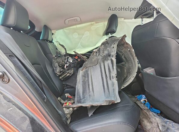 JTDKARFP0J3075201 2018 TOYOTA PRIUS Black Vista de los asientos traseros
