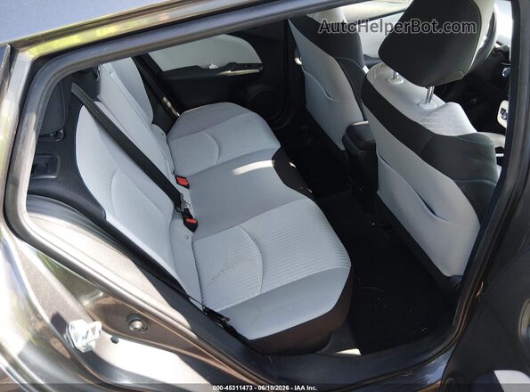 JTDKARFU3J3057975 2018 TOYOTA PRIUS Gray VIN կոդի պիտակի տեսք