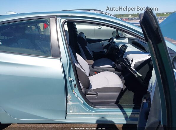 JTDL9MFU2M3024308 2021 TOYOTA PRIUS Teal Vista interior delantera