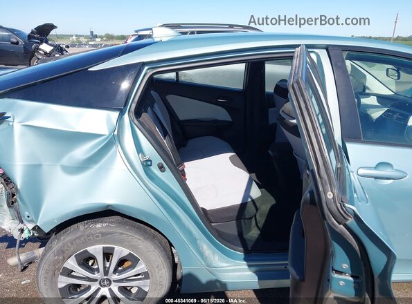 JTDL9MFU2M3024308 2021 TOYOTA PRIUS Teal Vista de la etiqueta del VIN