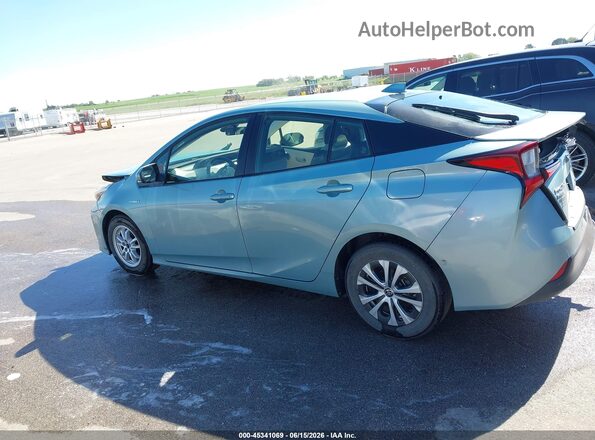 JTDL9MFU2M3024308 2021 TOYOTA PRIUS Teal Vista interior trasera
