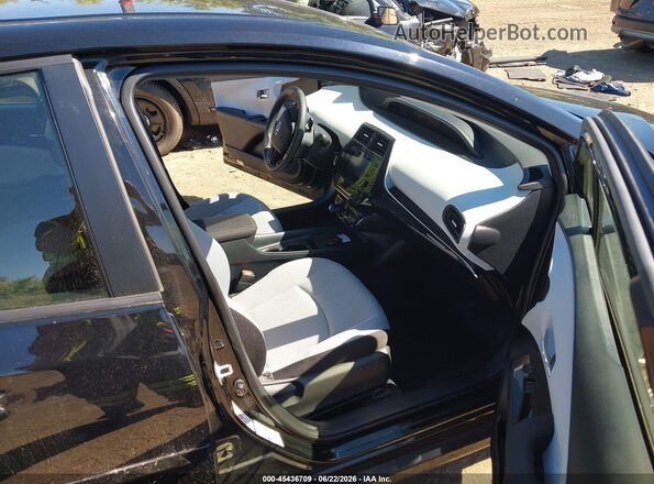 JTDL9RFU1K3012130 2019 TOYOTA PRIUS Black Widok wnętrza z przodu