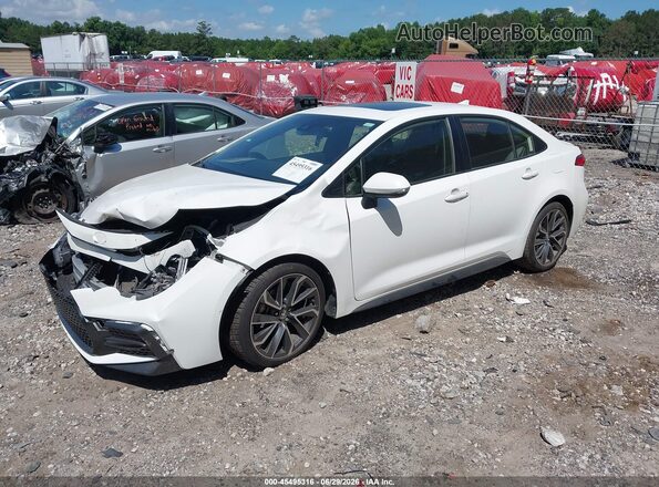JTDP4MCE6MJ054338 2021 TOYOTA COROLLA White Vista tres cuartos delantera izquierda