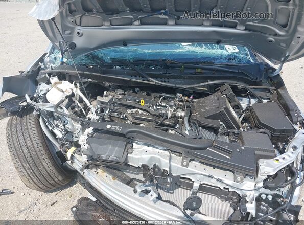JTDS4MCE1P3518459 2023 TOYOTA COROLLA Серебряный Вид сзади