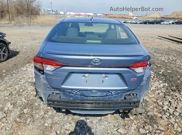 JTDS4MCE3NJ099720 2022 TOYOTA COROLLA Gray Rear view