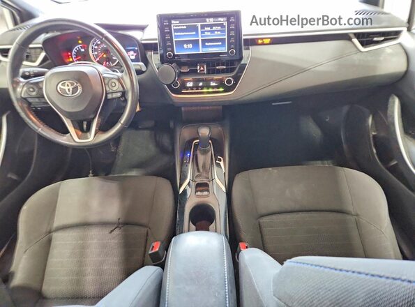 JTDS4MCE8MJ070518 2021 TOYOTA COROLLA Белый Вид панели приборов