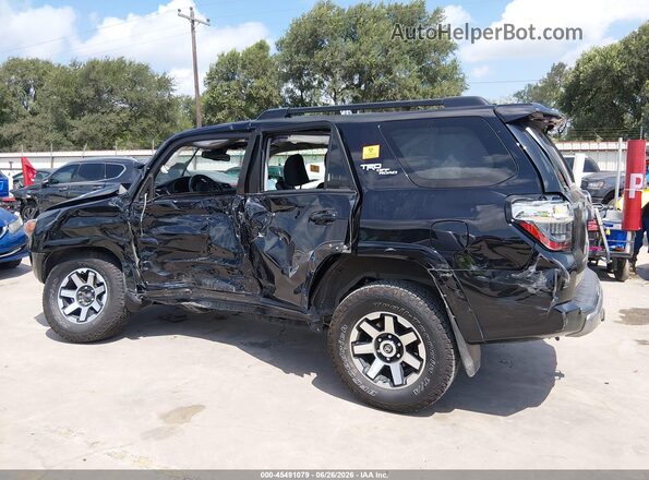 JTEPU5JR8P6091275 2023 TOYOTA 4RUNNER Черный Вид задней части салона