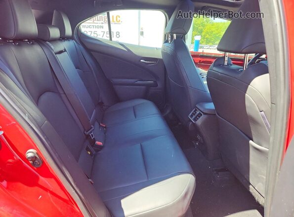 JTHP9JBH2P2063448 2023 LEXUS UX Red Vista de los asientos traseros