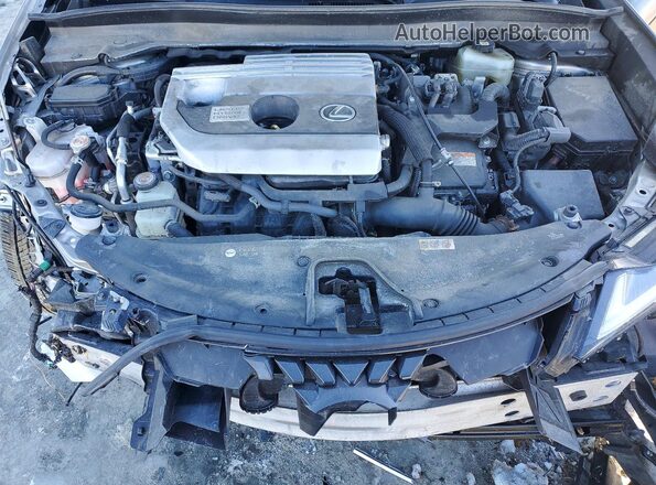 JTHP9JBH5M2037986 2021 LEXUS UX Tan ძრავის განყოფილების ხედი