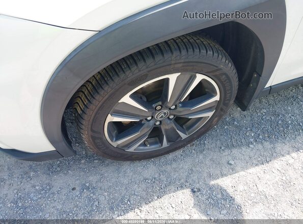 JTHP9JBH7L2021402 2020 LEXUS UX 250H Белый Вид панели приборов
