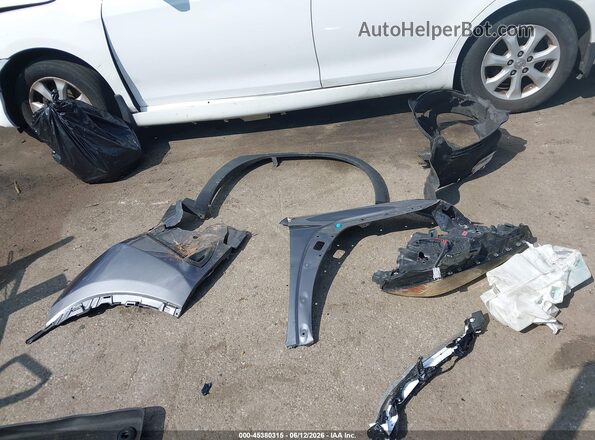 JTHU9JBH4K2005286 2019 LEXUS UX 250H Серый Вид щитка приборов