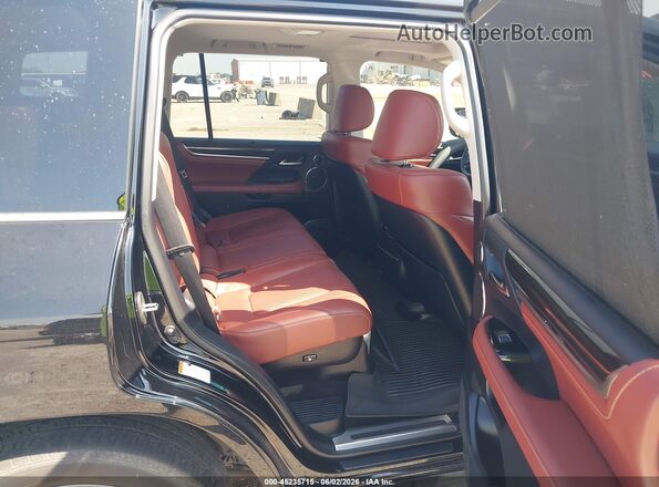 JTJDY7AX0M4355955 2021 LEXUS LX 570 Black Vista de la etiqueta del VIN