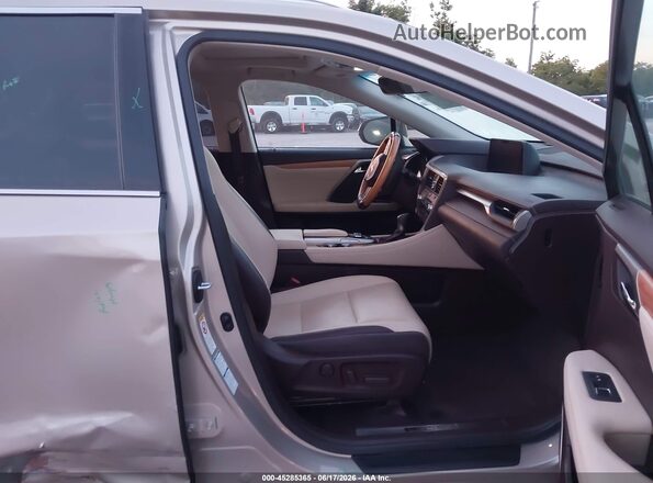 JTJDZKCA9J2012707 2018 LEXUS RX 350L Gold Vista interior delantera
