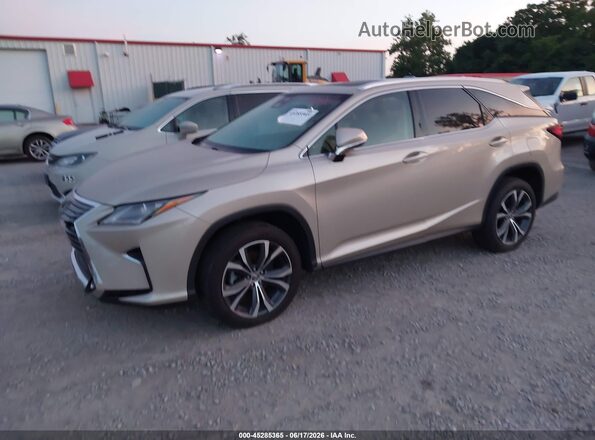 JTJDZKCA9J2012707 2018 LEXUS RX 350L Gold Vista tres cuartos delantera izquierda