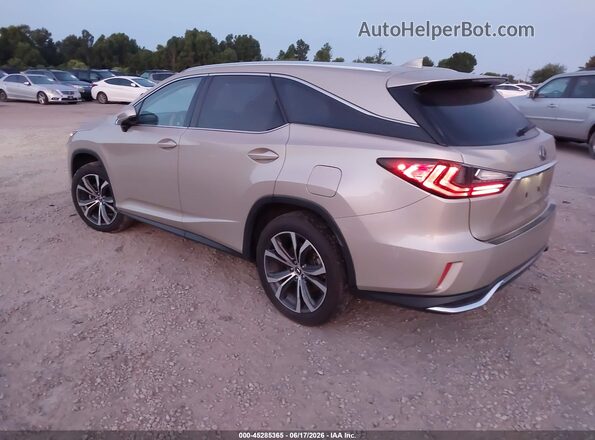 JTJDZKCA9J2012707 2018 LEXUS RX 350L Gold Trasero izquierdo