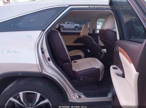 JTJDZKCA9J2012707 2018 LEXUS RX 350L Gold Vista de la etiqueta del VIN
