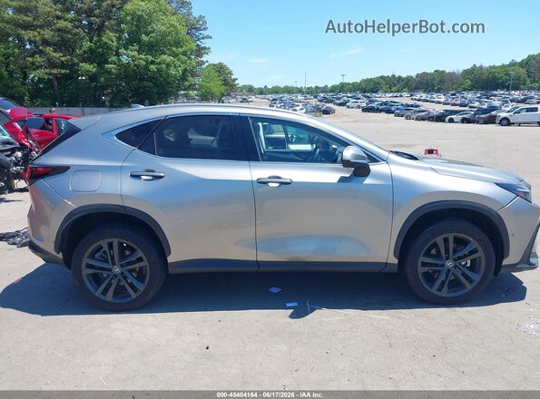 JTJHKCFZ9R2021612 2024 LEXUS NX 450H+ Silver Widok wnętrza z tyłu