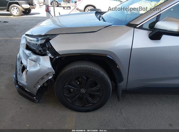 JTM16RFV3ND059585 2022 TOYOTA RAV4 HYBRID Silver Вид спереду