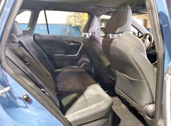 JTM16RFV6ND077143 2022 TOYOTA RAV4 Blue Rear interior view