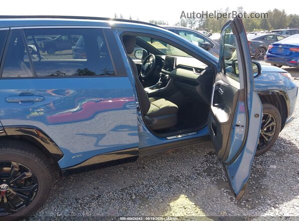 JTM16RFV6RD149755 2024 TOYOTA RAV4 HYBRID Blue Widok wnętrza z przodu