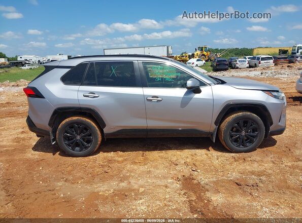 JTM16RFVXND050706 2022 TOYOTA RAV4 HYBRID Серебряный Вид задней части салона