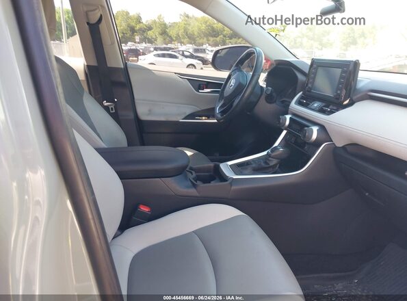JTMA1RFVXKD523952 2019 TOYOTA RAV4 Blue Widok wnętrza z przodu