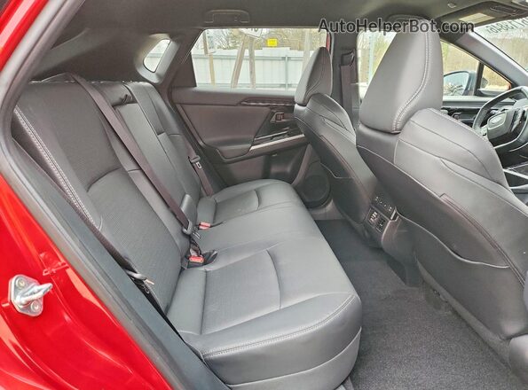 JTMABABA2RA072738 2024 SUBARU SOLTERRA Red Vista interior trasera