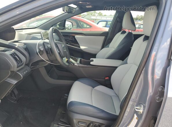 JTMABABA8PA018647 2023 SUBARU SOLTERRA Blue Widok wnętrza z przodu