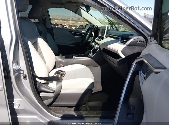 JTMB6RFV0MD039796 2021 TOYOTA RAV4 HYBRID Silver Front interior view