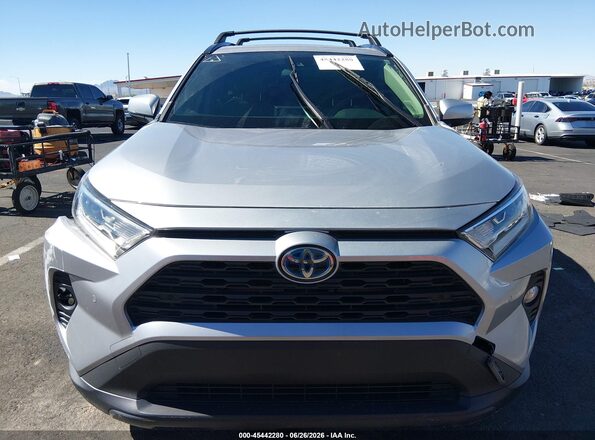 JTMB6RFV0MD039796 2021 TOYOTA RAV4 HYBRID Silver Rear interior view