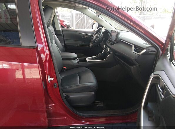 JTMB6RFV0ND059452 2022 TOYOTA RAV4 HYBRID Red Front interior view