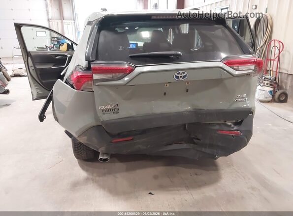 JTMB6RFV0PD110581 2023 TOYOTA RAV4 HYBRID Light Blue Vista interior delantera