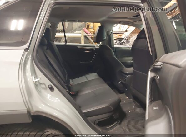 JTMB6RFV0PD110581 2023 TOYOTA RAV4 HYBRID Light Blue Vista de los asientos traseros