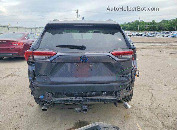 JTMB6RFV0PD541678 2023 TOYOTA RAV4 Charcoal Vista trasera