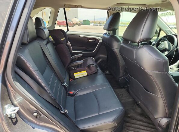 JTMB6RFV4MD028929 2021 TOYOTA RAV4 Charcoal Vista de los asientos traseros