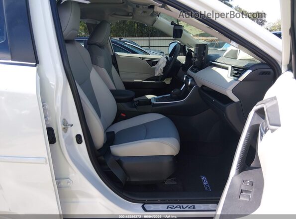 JTMB6RFV4SJ079166 2025 TOYOTA RAV4 HYBRID White Widok wnętrza z przodu