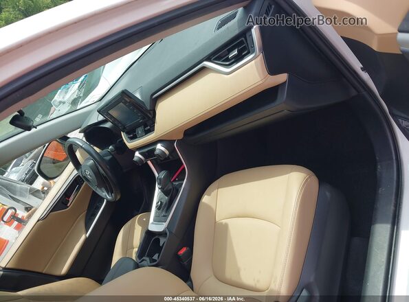 JTMB6RFV5MJ007153 2021 TOYOTA RAV4 HYBRID White Vista interior delantera