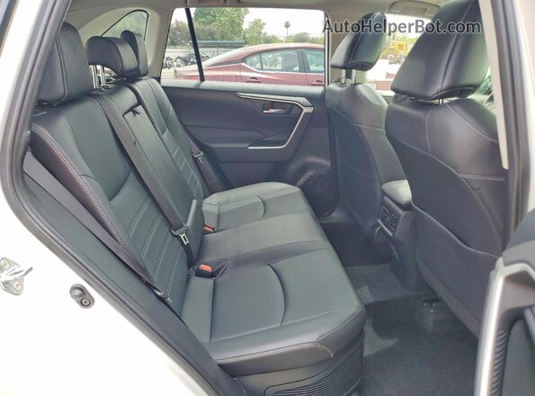JTMB6RFVXSJ069869 2025 TOYOTA RAV4 White Rear interior view