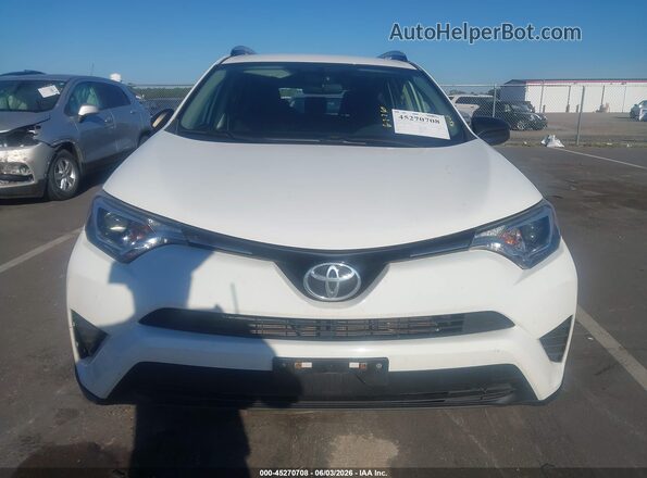 JTMBFREV0GJ075026 2016 TOYOTA RAV4 White ხელსაწყოთა პანელის ხედი