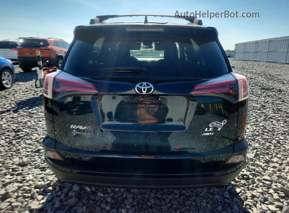 JTMBFREV0HJ131810 2017 TOYOTA RAV4 Blue Rear view