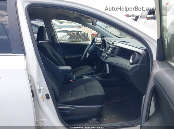 JTMBFREV0HJ165553 2017 TOYOTA RAV4 White Front interior view