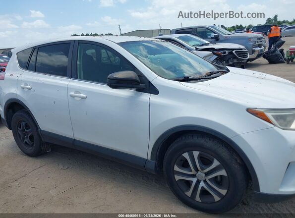 JTMBFREV0HJ165553 2017 TOYOTA RAV4 White Rear interior view