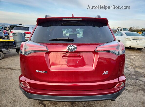 JTMBFREV1JD223951 2018 TOYOTA RAV4 Red Rear view