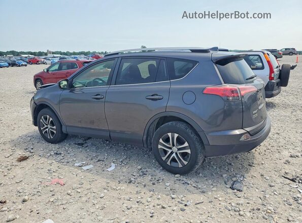 JTMBFREV2HJ710099 2017 TOYOTA RAV4 Charcoal Trasero izquierdo