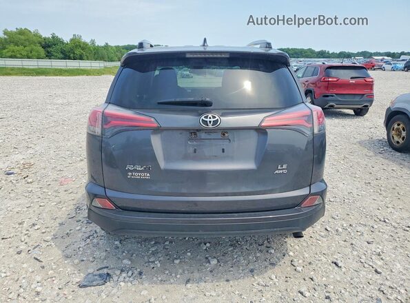 JTMBFREV2HJ710099 2017 TOYOTA RAV4 Charcoal Vista trasera