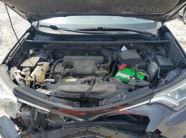 JTMBFREV2HJ710099 2017 TOYOTA RAV4 Charcoal Vista del compartimento del motor