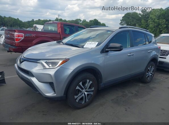 JTMBFREV2JJ211776 2018 TOYOTA RAV4 Серебряный Передняя левая четверть