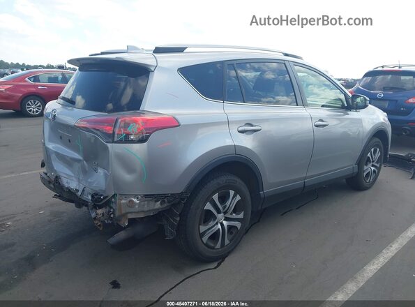 JTMBFREV2JJ211776 2018 TOYOTA RAV4 Серебряный Задняя правая четверть