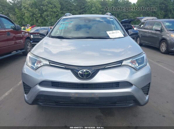 JTMBFREV2JJ211776 2018 TOYOTA RAV4 Серебряный Вид задней части салона