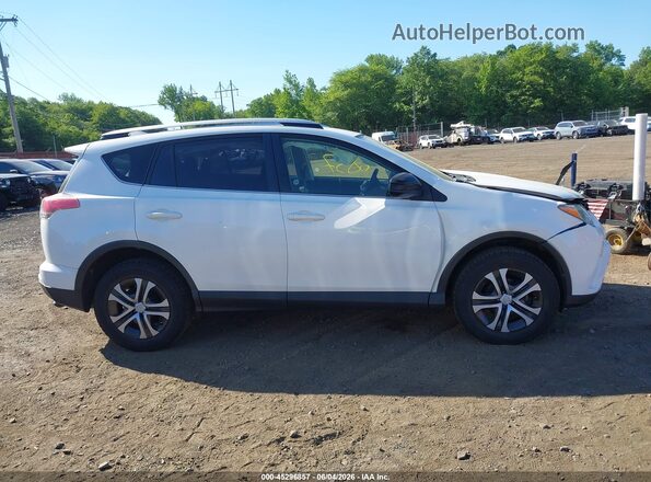 JTMBFREV3GJ099224 2016 TOYOTA RAV4 White Vista interior trasera